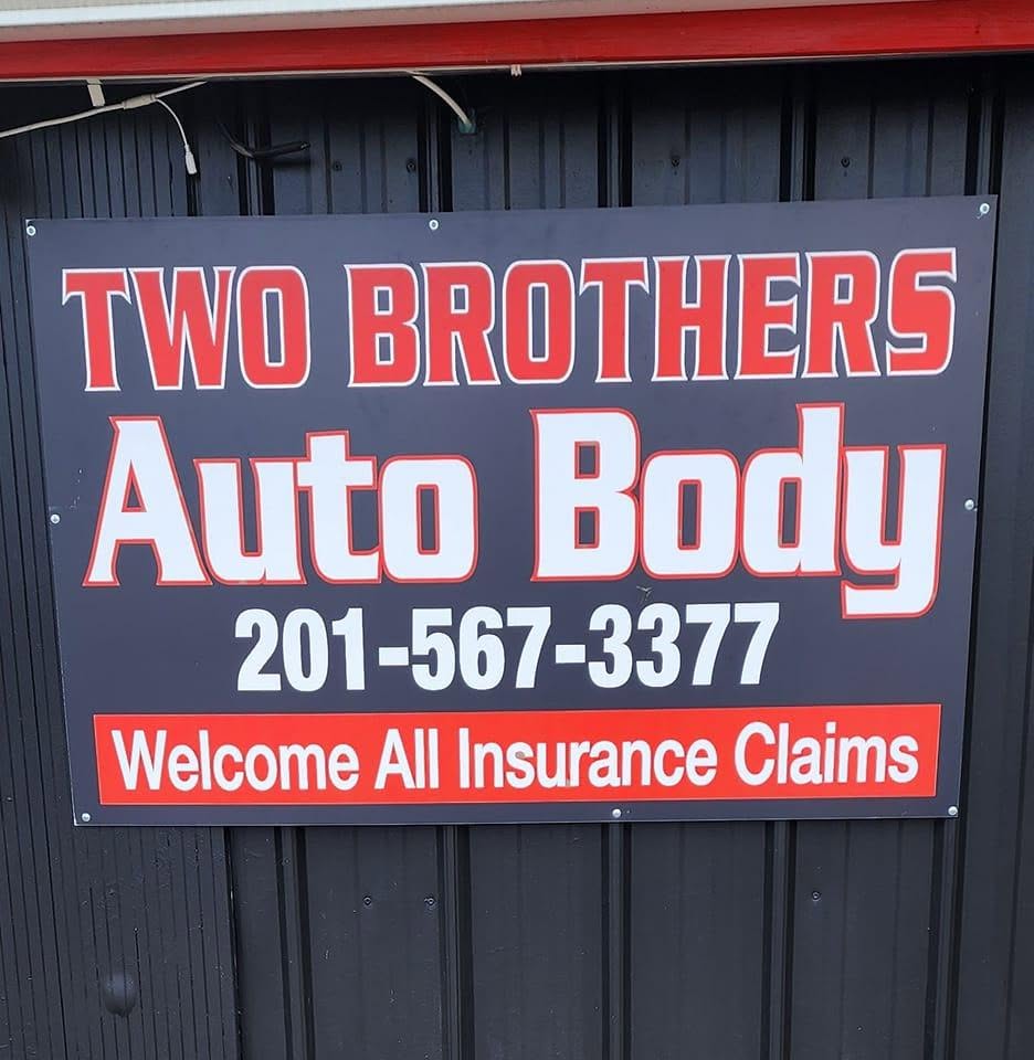 The Two Brothers Auto Body sign on the shop building in Englewood, New Jersey